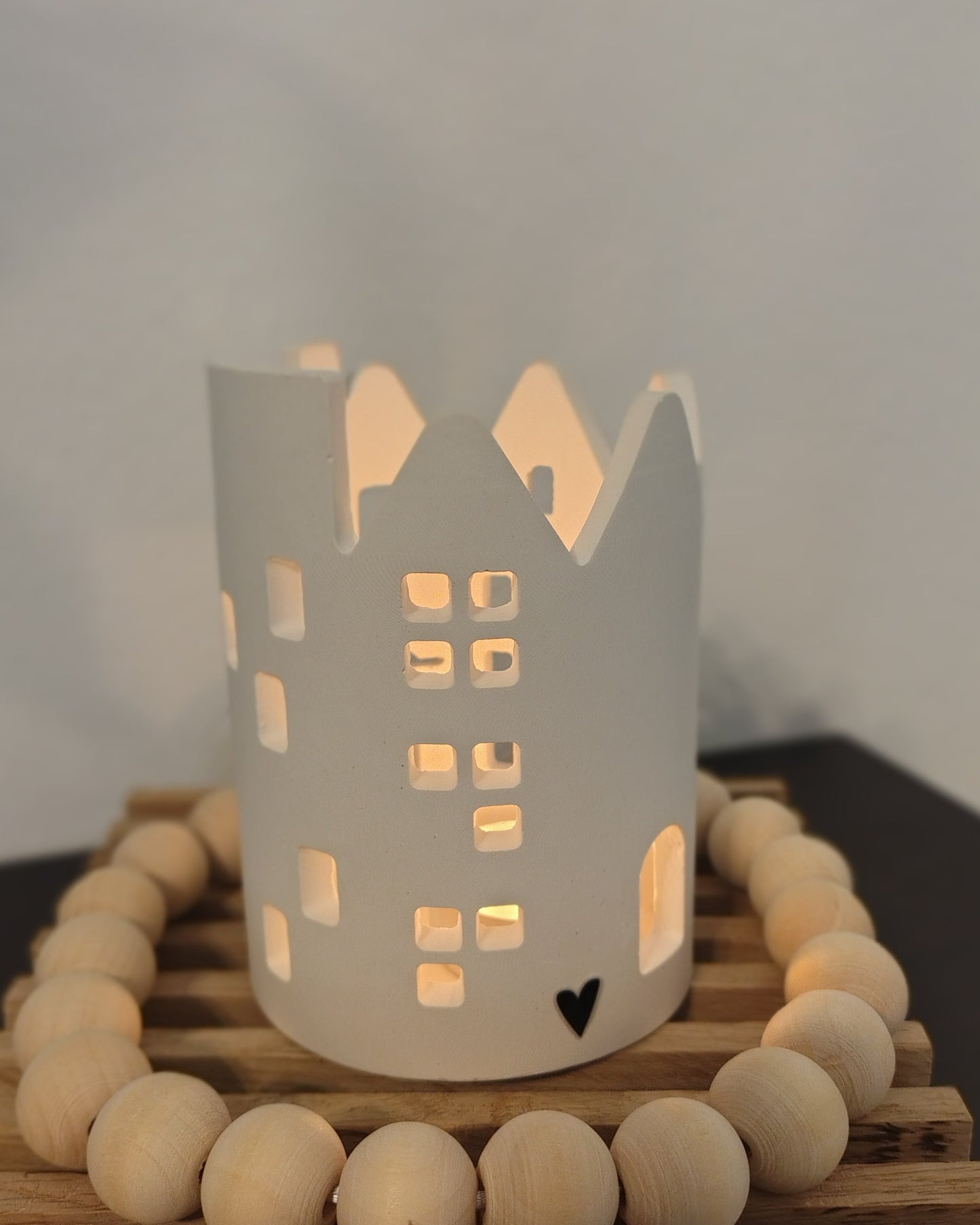 Casa luminosa porta candela