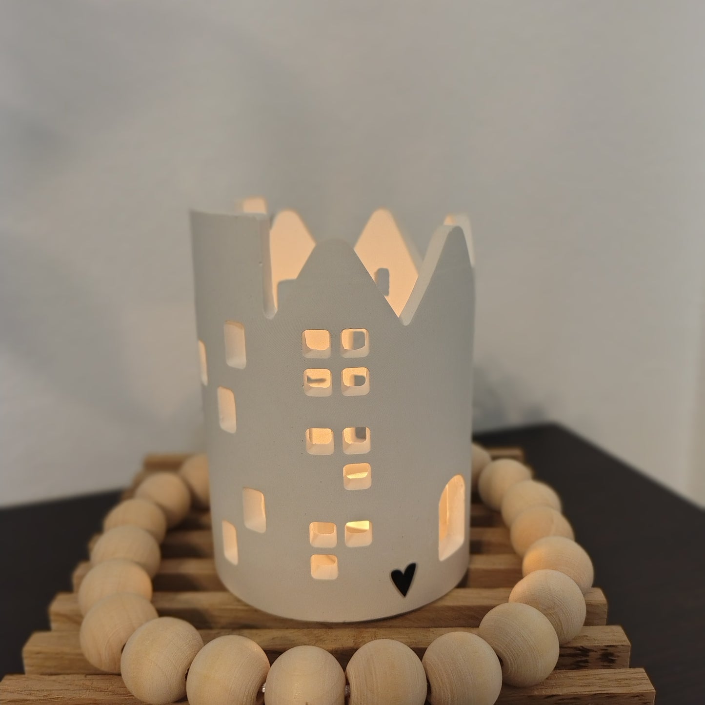 Casa luminosa porta candela