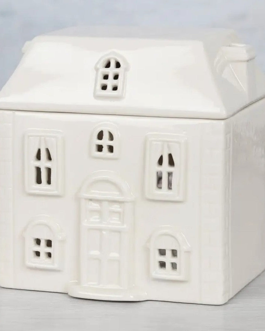 Bruciatore di olio in ceramica bianca a forma di casa
